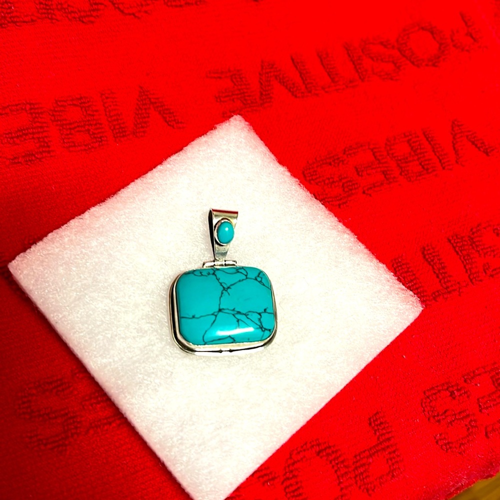 925 Silver pendant with Faux turquoise stone pendant . 70’s vintage.